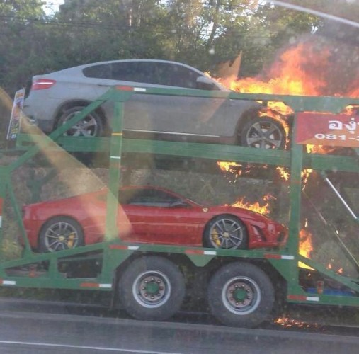 Supercars on truck in flames in Thailand-6