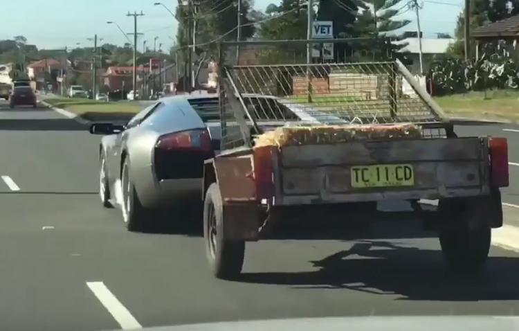 Lamborghini Murcielago towing trailer