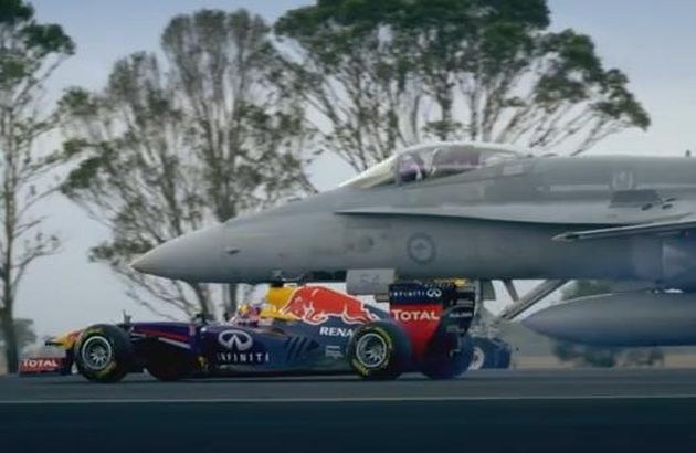 Red Bull F1 RB7 takes on F/A Hornet fighter jet