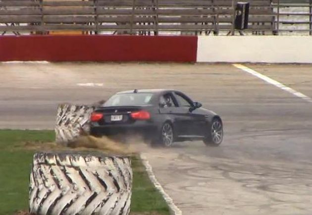 BMW M3 E90 crashes into a massive truck tyre
