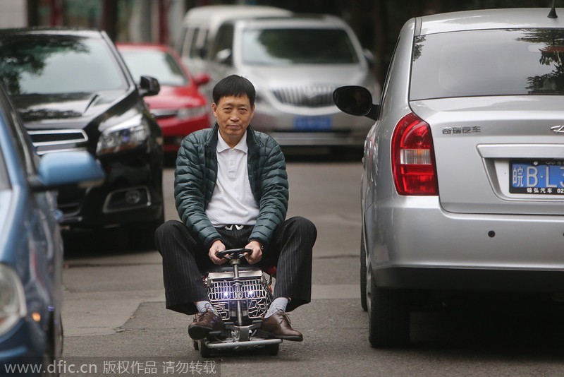 Shanghai man creates miniature car, smallest in the world?