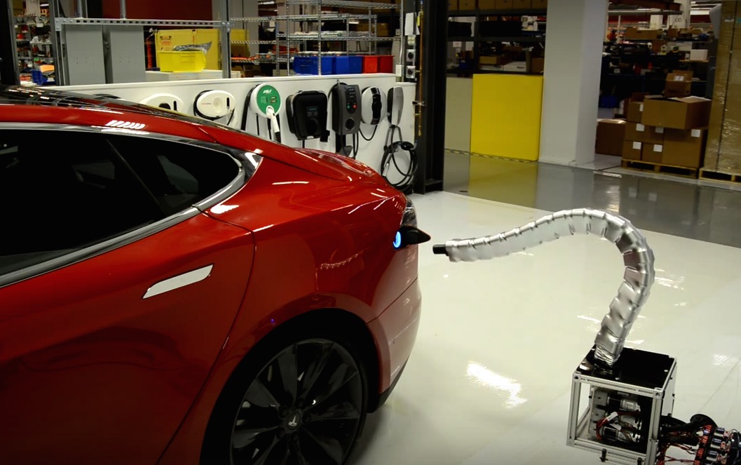 Tesla shows off automated snake-like recharge arm (video)