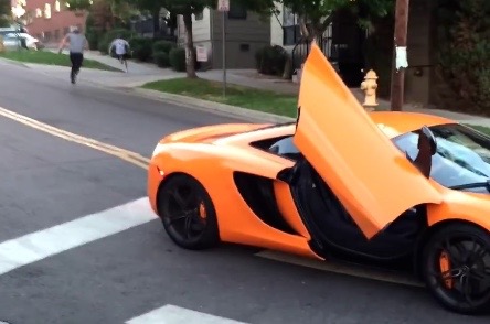 McLaren MP4-12C gets attacked by skateboard (video)