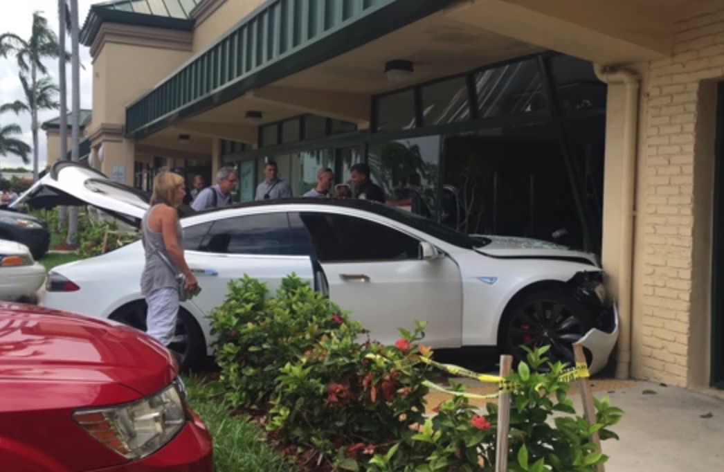 Tesla Mode S crashes into gym, driver blames car