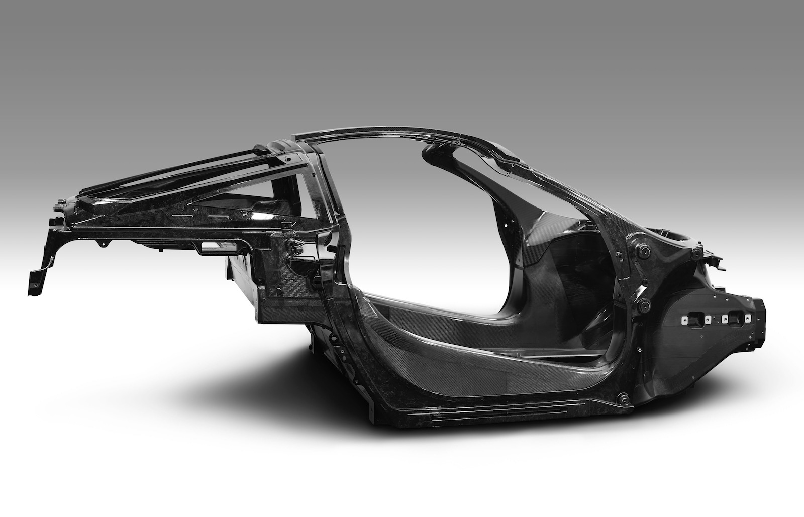McLaren confirms new Super Series model, reveals carbon tub