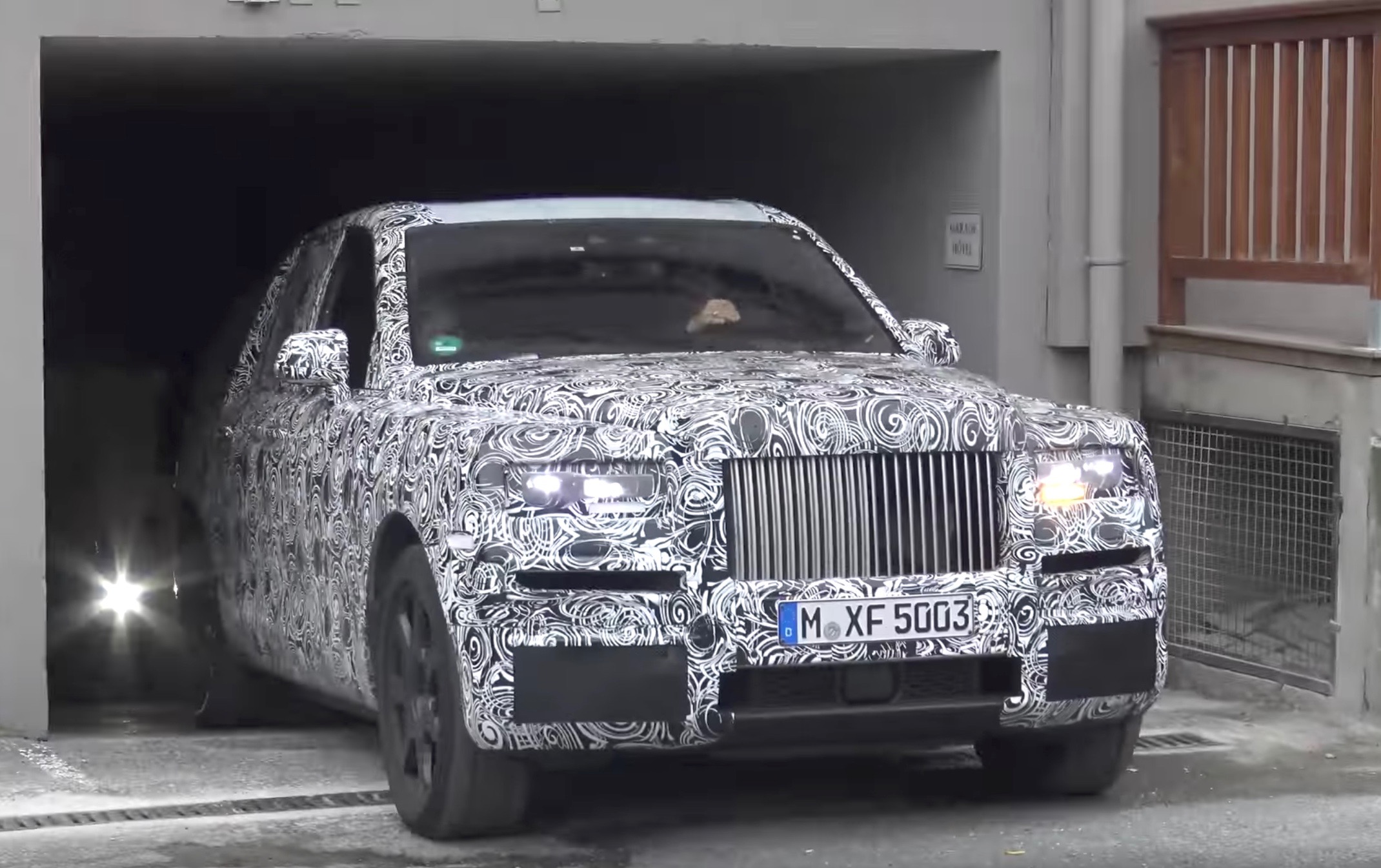 Rolls-Royce Cullinan SUV spotted leaving mysterious garage in Germany (video)